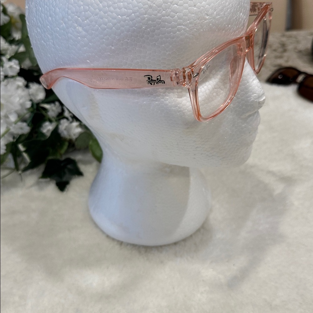 Ray ban glasses.